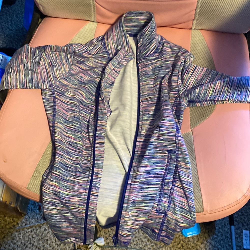 This is a two thing of athletic zip ups